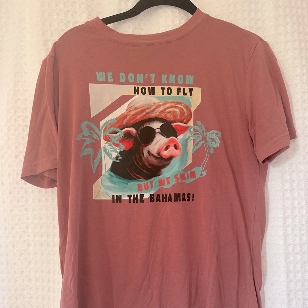 Soft t-shirt from the Bahamas from a local designer. Worn once for a shoot.